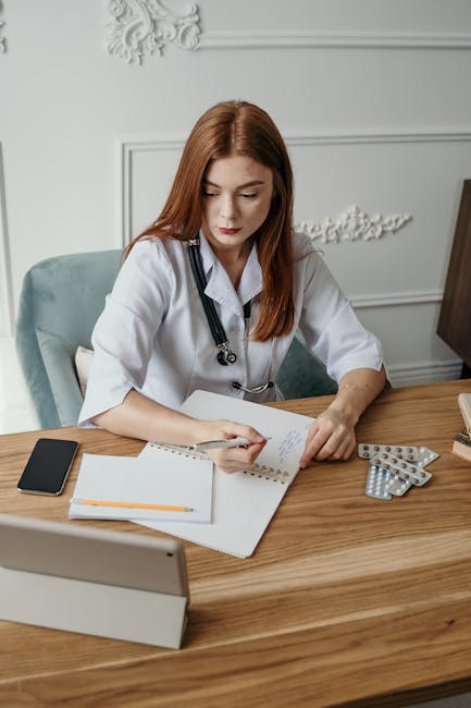 Professional doctor in white coat in modern medical office